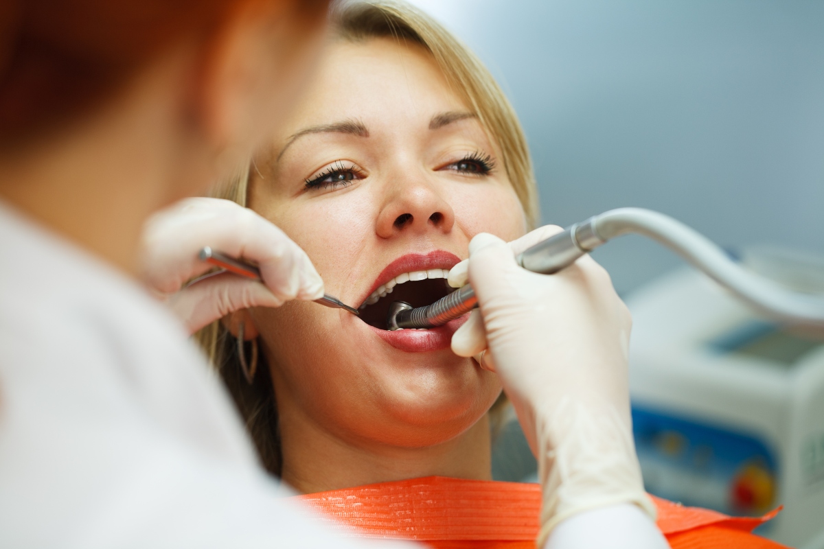 woman receiving dental procedure